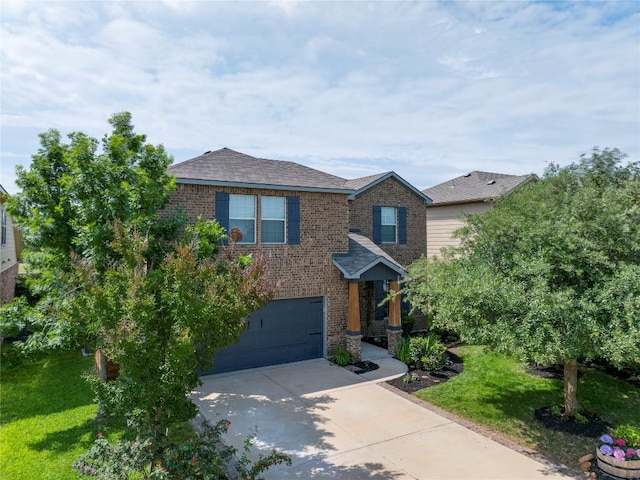 205 Talon Grasp Trl, Leander, TX 78641 - traditional-style home with brick siding, driveway, an attached garage, and a front yard