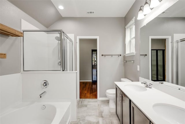 205 Talon Grasp Trl, Leander, TX 78641 - bathroom with a shower stall, a bath, double vanity, marble finish flooring, and toilet