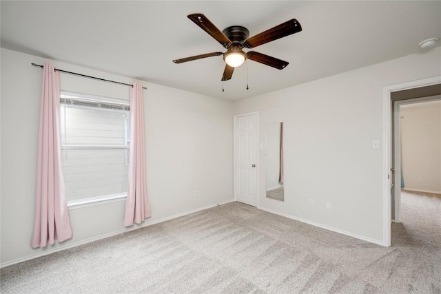 205 Talon Grasp Trl, Leander, TX 78641 - carpeted spare room with a ceiling fan, a smoke detector, and baseboards