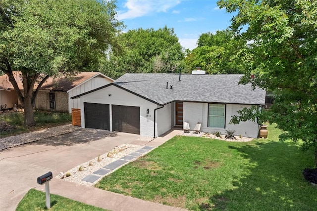 2812 Sissinghurst Dr, Austin, TX 78745 - ranch-style home featuring driveway, a garage, roof with shingles, a front lawn, and brick siding