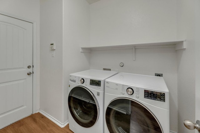 5928 Pescia St, Round Rock, TX 78665 - laundry area featuring independent washer and dryer and light wood-style floors