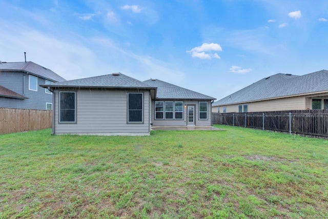 5928 Pescia St, Round Rock, TX 78665 - rear view of property with a fenced backyard and a shingled roof