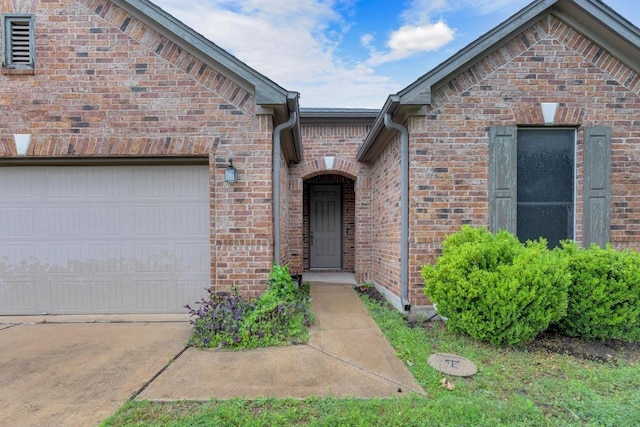 5928 Pescia St, Round Rock, TX 78665 - entrance to property with brick siding, a garage, and driveway