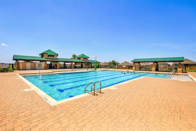 5928 Pescia St, Round Rock, TX 78665 - community pool with a gazebo and a patio