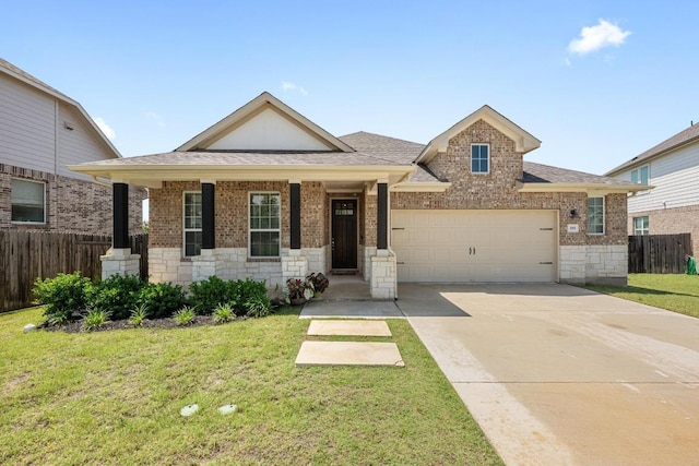view of front facade featuring a garage, driveway, and brick siding