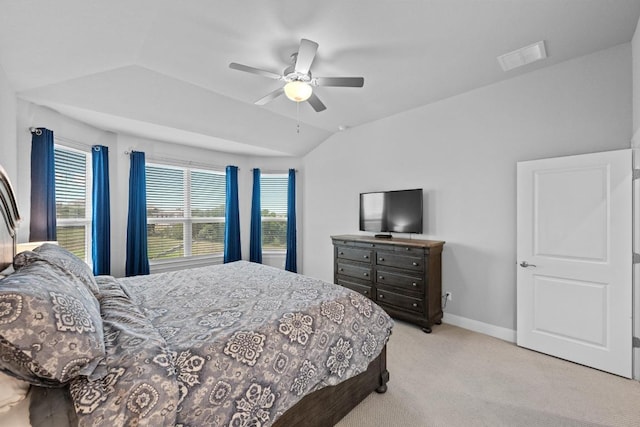 bedroom with carpet, lofted ceiling, baseboards, and ceiling fan