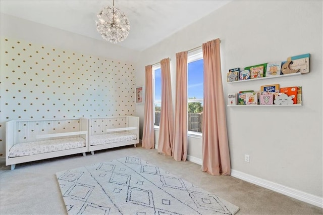 1513 Burr Pkwy, Leander, TX 78641 - unfurnished room featuring carpet flooring, a chandelier, and baseboards