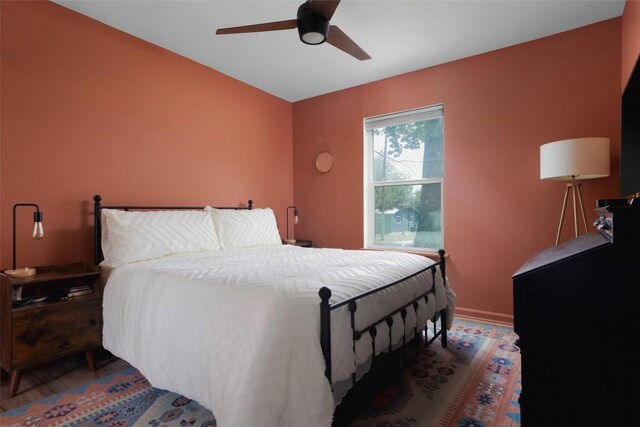 4906 Hilldale Dr, Austin, TX 78723 - bedroom featuring ceiling fan and wood finished floors