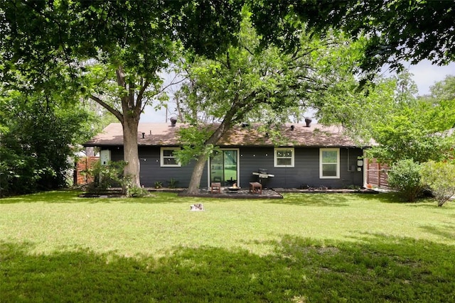 4906 Hilldale Dr, Austin, TX 78723 - rear view of property featuring a lawn