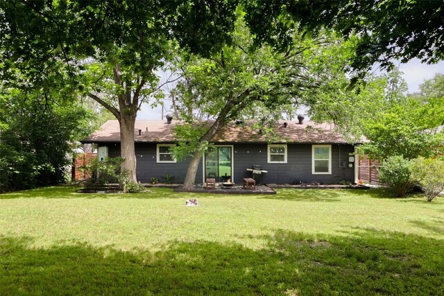 4906 Hilldale Dr, Austin, TX 78723 - back of property featuring a lawn