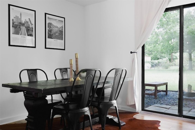 4906 Hilldale Dr, Austin, TX 78723 - dining room with baseboards and wood finished floors