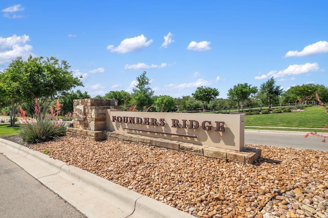 view of community sign