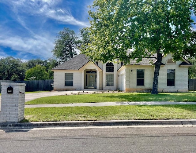 1816 Lancaster St, San Marcos, TX 78666 - view of property hidden behind natural elements with brick siding and a shingled roof