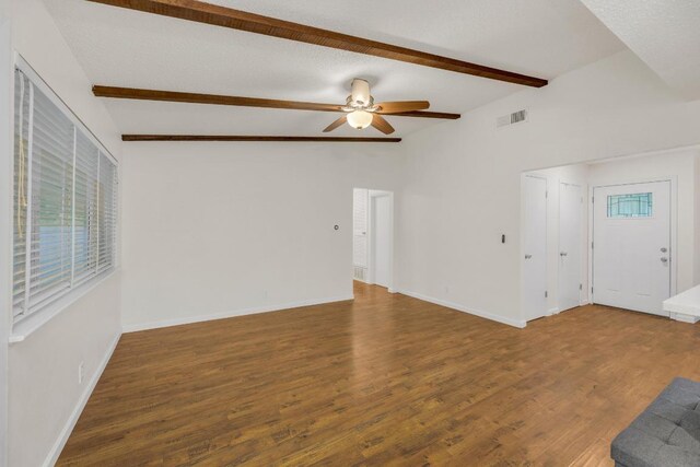 9811 Hansford Dr, Austin, TX 78753 - unfurnished living room with a ceiling fan, wood finished floors, and baseboards