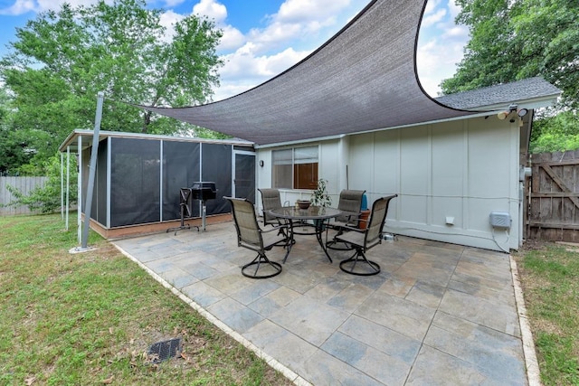9811 Hansford Dr, Austin, TX 78753 - view of patio featuring a sunroom and outdoor dining area