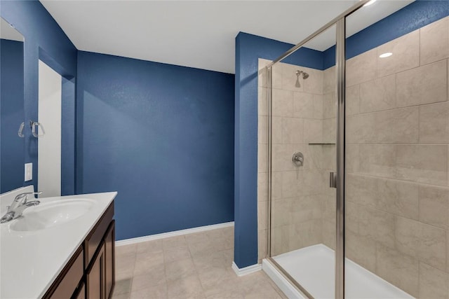 625 Taggart Trl, Jarrell, TX 76537 - full bathroom featuring a stall shower, vanity, and baseboards