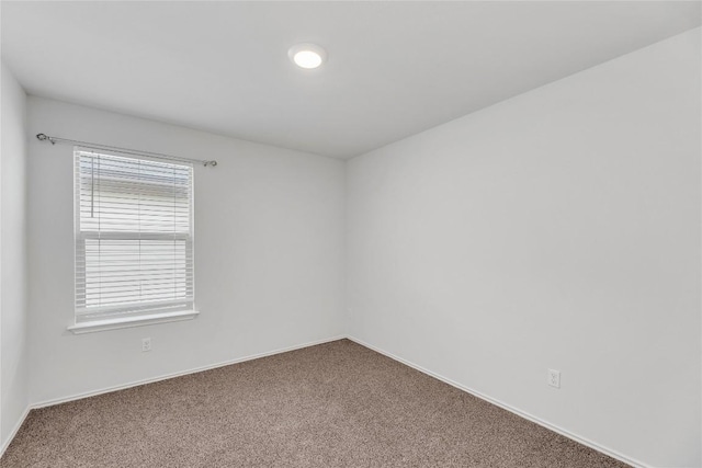 625 Taggart Trl, Jarrell, TX 76537 - empty room with carpet and baseboards