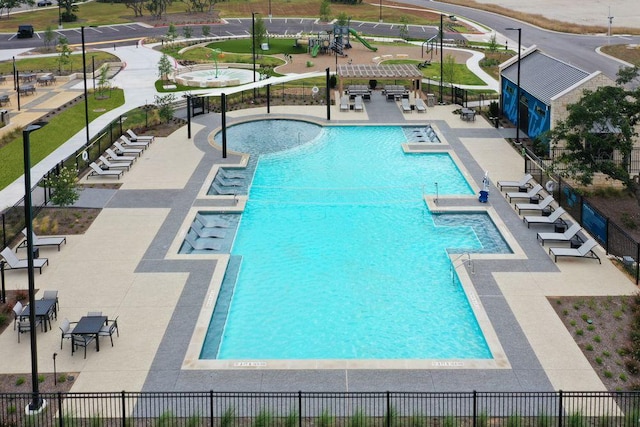 305 Golden Sage Ave, Georgetown, TX 78633 - community pool featuring a patio area