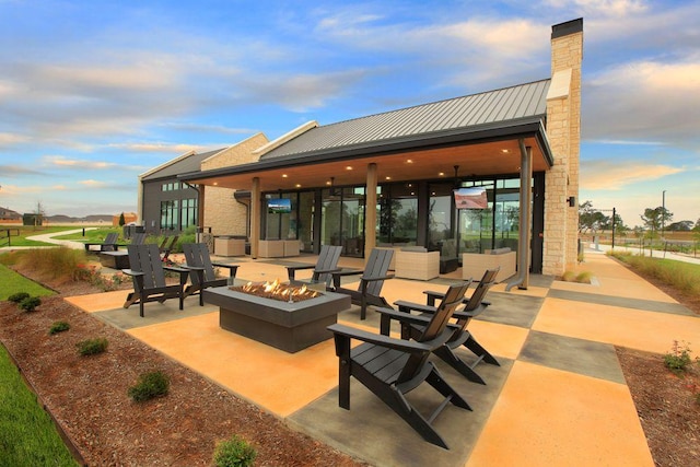 305 Golden Sage Ave, Georgetown, TX 78633 - view of patio / terrace with a fire pit