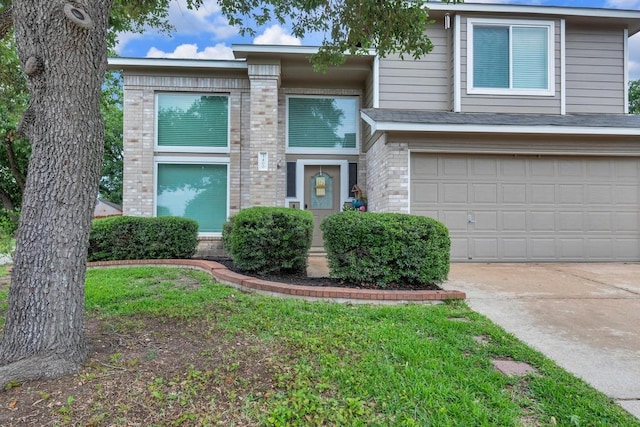 3400 Settlement Dr, Round Rock, TX 78665 - view of front of property featuring brick siding, driveway, and a garage