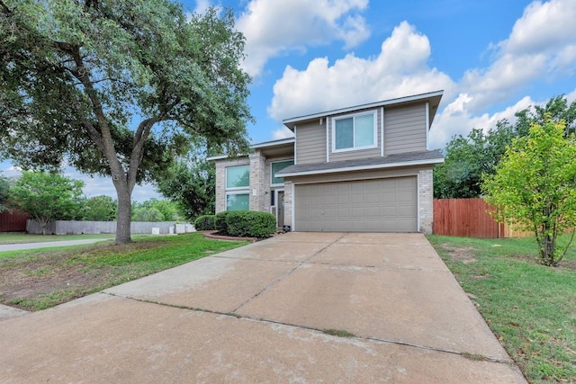 3400 Settlement Dr, Round Rock, TX 78665 - traditional home with brick siding, an attached garage, and driveway