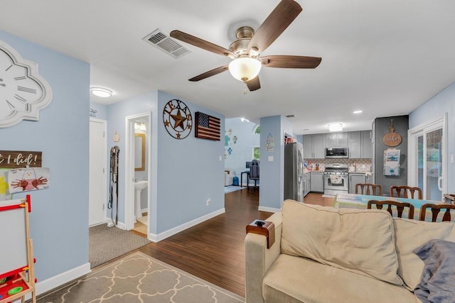 3400 Settlement Dr, Round Rock, TX 78665 - living area featuring a ceiling fan, dark wood-style floors, baseboards, and recessed lighting