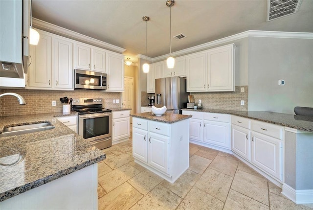 11805 Lake Stone Dr, Austin, TX 78738 - kitchen featuring stainless steel appliances, a sink, dark stone countertops, decorative backsplash, and ornamental molding