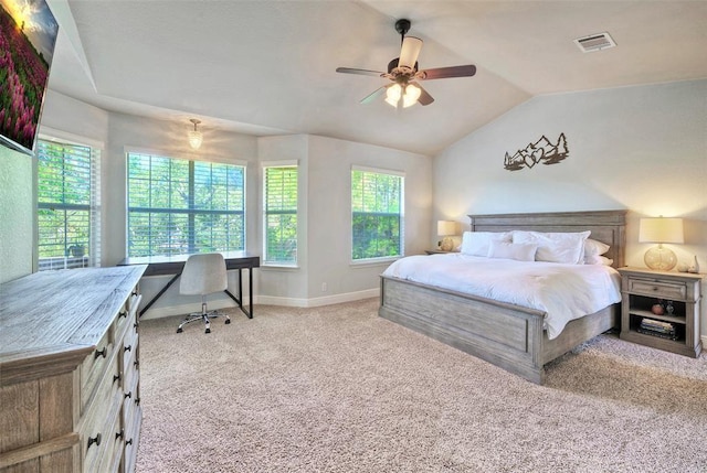 11805 Lake Stone Dr, Austin, TX 78738 - bedroom with an office area, multiple windows, light carpet, vaulted ceiling, and a ceiling fan