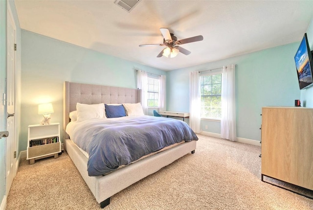 11805 Lake Stone Dr, Austin, TX 78738 - carpeted bedroom with baseboards and a ceiling fan