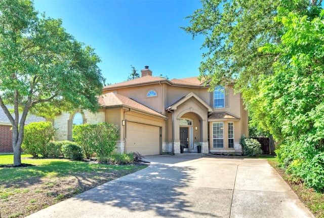11805 Lake Stone Dr, Austin, TX 78738 - traditional-style home with stone siding, stucco siding, an attached garage, a chimney, and driveway