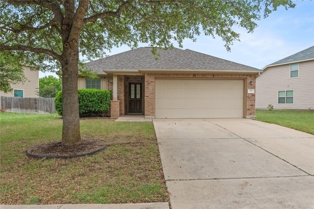 ranch-style house featuring brick siding, an attached garage, driveway, and roof with shingles