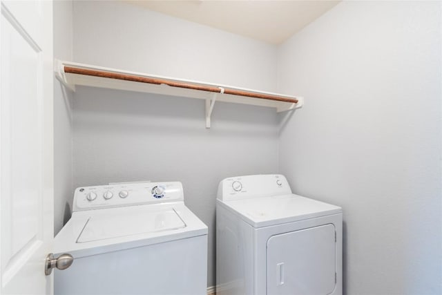 washroom with separate washer and dryer