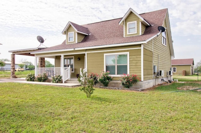 163 Buckeye, Seguin, TX 78155 - view of front facade featuring covered porch, a front lawn, and roof with shingles