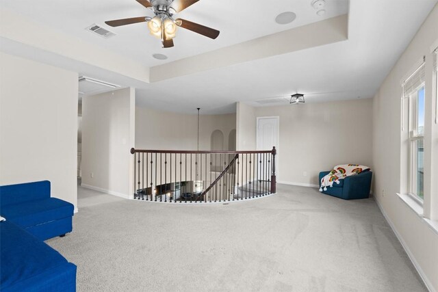 8058 Arezzo Dr, Round Rock, TX 78665 - sitting room with an upstairs landing, carpet, attic access, and ceiling fan
