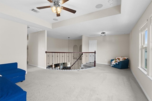 8058 Arezzo Dr, Round Rock, TX 78665 - sitting room with an upstairs landing, carpet flooring, attic access, and a ceiling fan