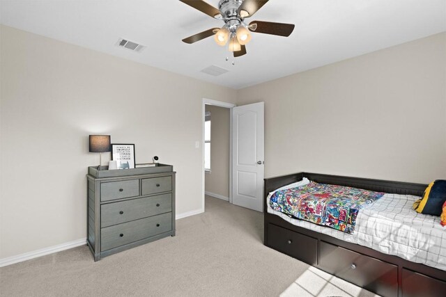 8058 Arezzo Dr, Round Rock, TX 78665 - bedroom with light colored carpet and a ceiling fan