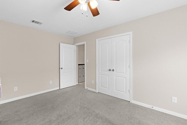 8058 Arezzo Dr, Round Rock, TX 78665 - unfurnished bedroom featuring carpet, a closet, and a ceiling fan