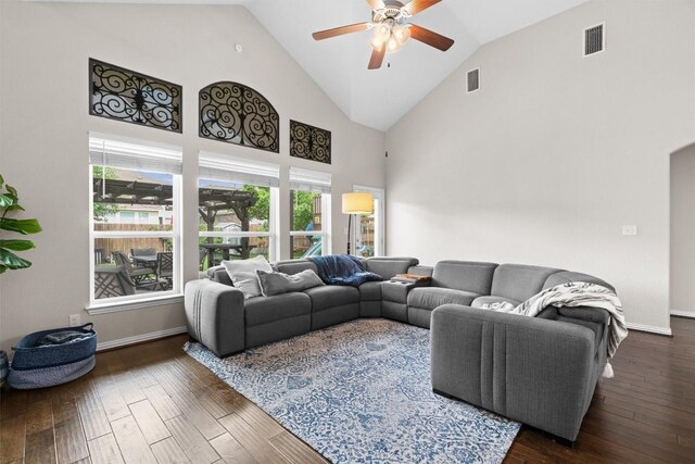 8058 Arezzo Dr, Round Rock, TX 78665 - living room featuring high vaulted ceiling, plenty of natural light, ceiling fan, and dark wood-style flooring