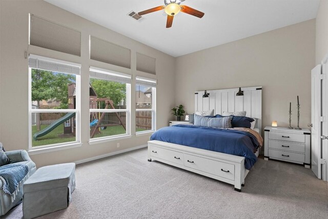8058 Arezzo Dr, Round Rock, TX 78665 - carpeted bedroom featuring multiple windows and ceiling fan