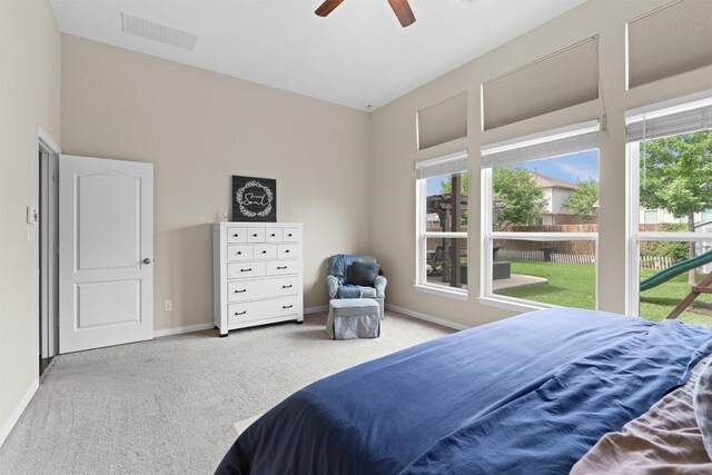 8058 Arezzo Dr, Round Rock, TX 78665 - carpeted bedroom with baseboards and ceiling fan