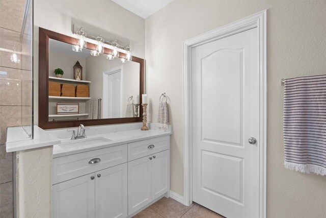 8058 Arezzo Dr, Round Rock, TX 78665 - bathroom featuring vanity and tile patterned flooring