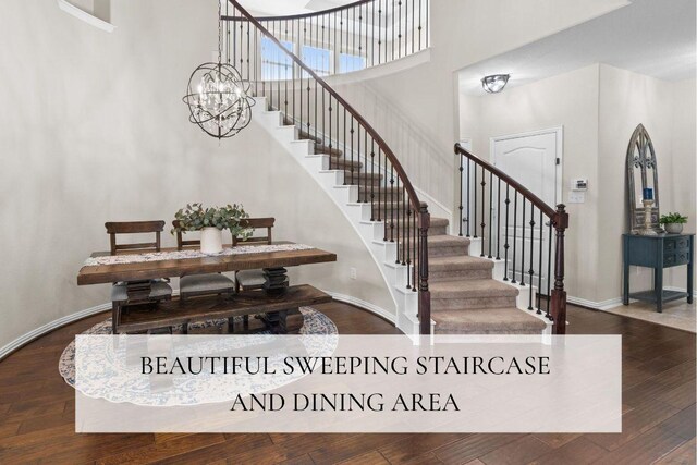 8058 Arezzo Dr, Round Rock, TX 78665 - stairway featuring a high ceiling, wood finished floors, and a chandelier