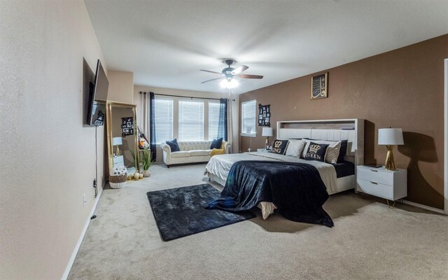 316 Carrington St, Hutto, TX 78634 - carpeted bedroom with ceiling fan and a textured wall