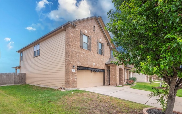316 Carrington St, Hutto, TX 78634 - view of front of property featuring brick siding, driveway, and an attached garage