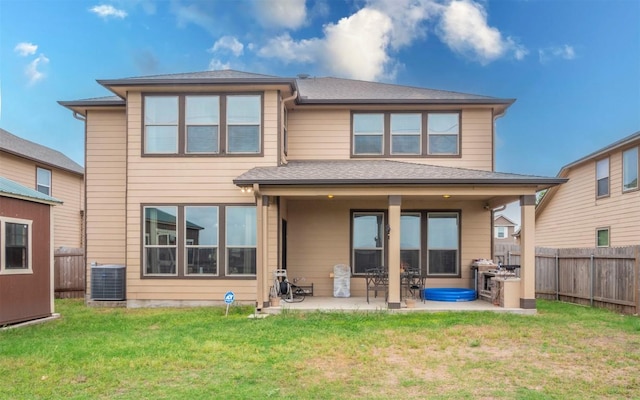 316 Carrington St, Hutto, TX 78634 - rear view of property with a patio, a fenced backyard, and roof with shingles