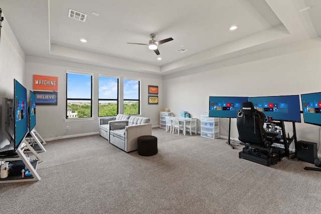 321 Cumberland Cv, Georgetown, TX 78628 - game room with a tray ceiling, carpet, a ceiling fan, recessed lighting, and an office area