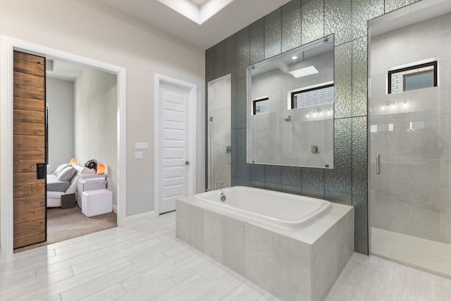 321 Cumberland Cv, Georgetown, TX 78628 - bathroom with a tile shower and a bath
