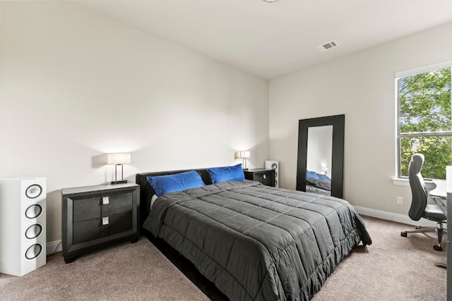 321 Cumberland Cv, Georgetown, TX 78628 - carpeted bedroom with baseboards and an office area