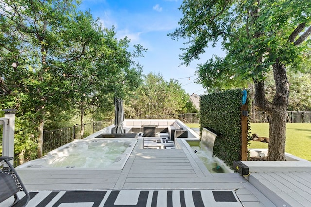 321 Cumberland Cv, Georgetown, TX 78628 - wooden terrace featuring a fenced backyard and an outdoor hangout area