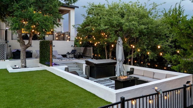 321 Cumberland Cv, Georgetown, TX 78628 - view of patio featuring an outdoor living space with a fire pit